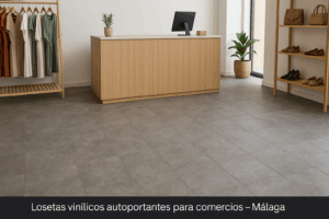Suelo vinílico en losetas autoportantes imitación piedra en local comercial